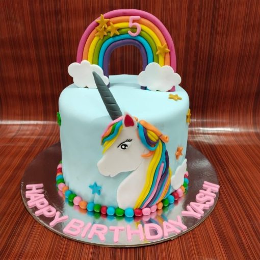 Blue Unicorn With Rainbow Cake